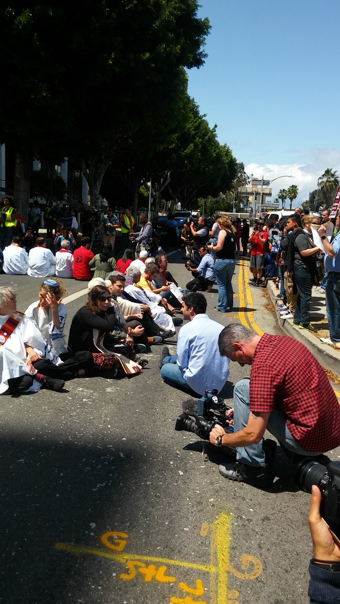 Los Angeles clergy protest ICE raids, detentions, and deportations.